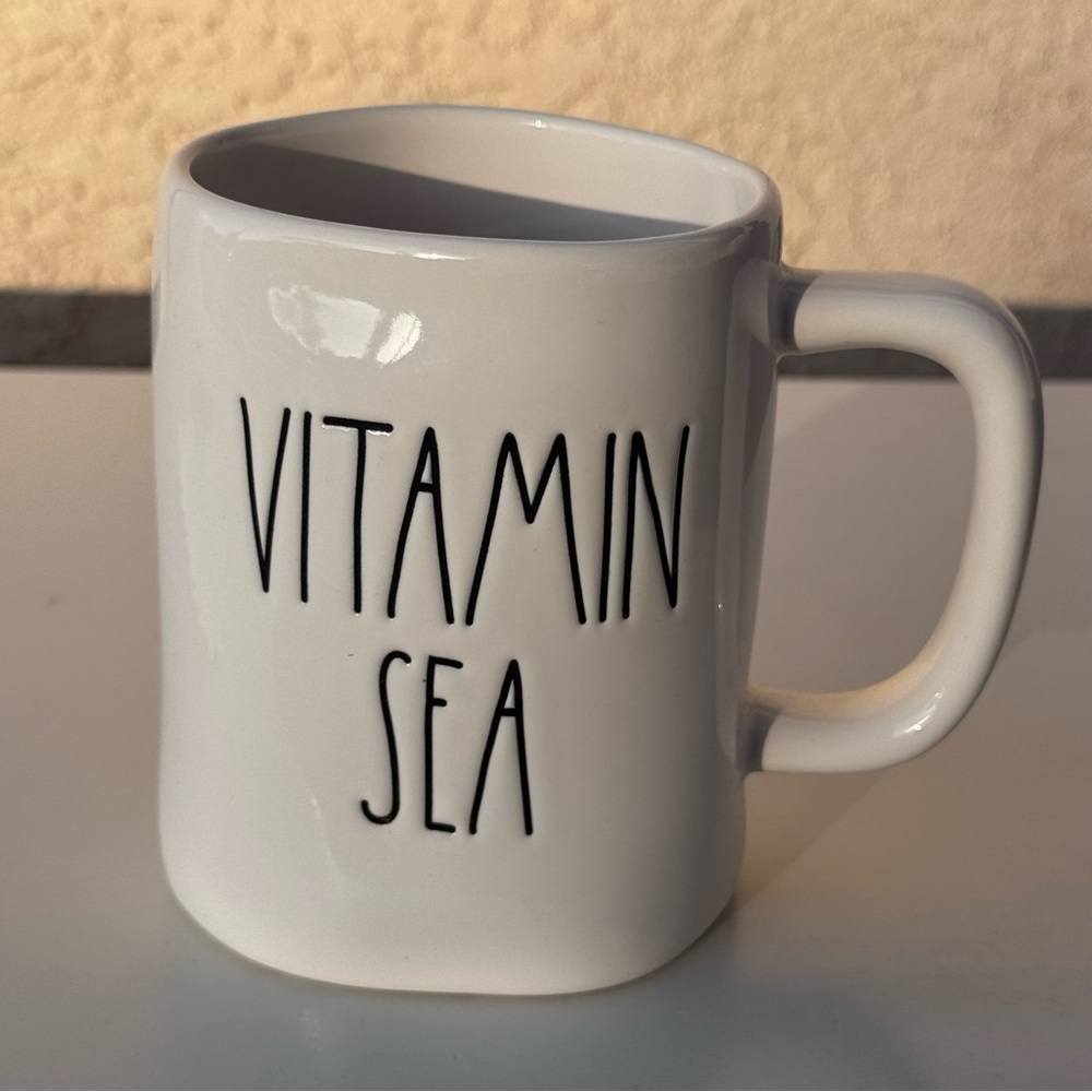 White Ceramic Mug with 'Vitamin Sea' Text
